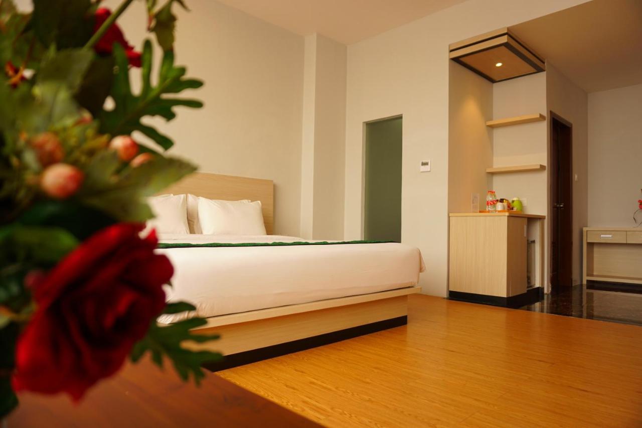 Airish Hotel Palembang Exterior foto